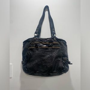 Johnny was leather shoulder bag